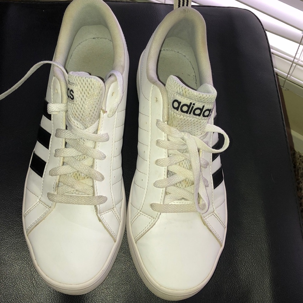Men’s black and white low top adidas